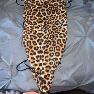 Cheetah print criss cross back bodysuit